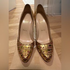Christian Louboutin gold metallic pumps